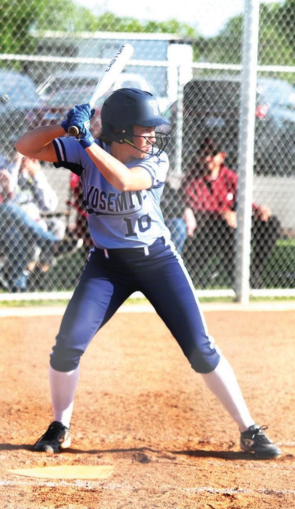 Softball team suffers two losses